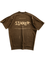 Trendy oversized brown T-shirt with bold graphic print – perfect streetwear for Gen Z in India, ideal for casual college and urban fashion looks